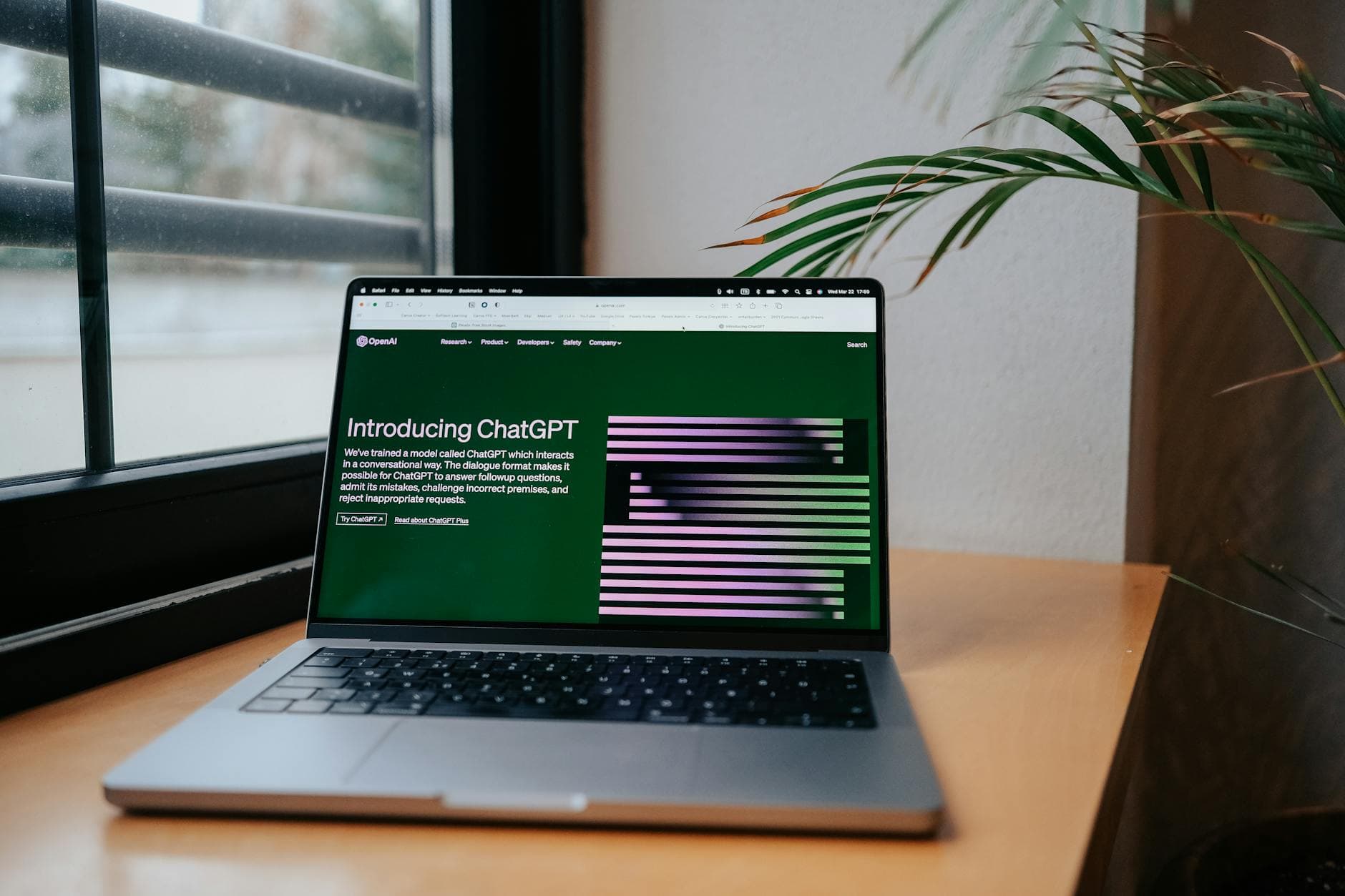 Person working on a laptop with ChatGPT interface visible, symbolizing starting an online business with AI.